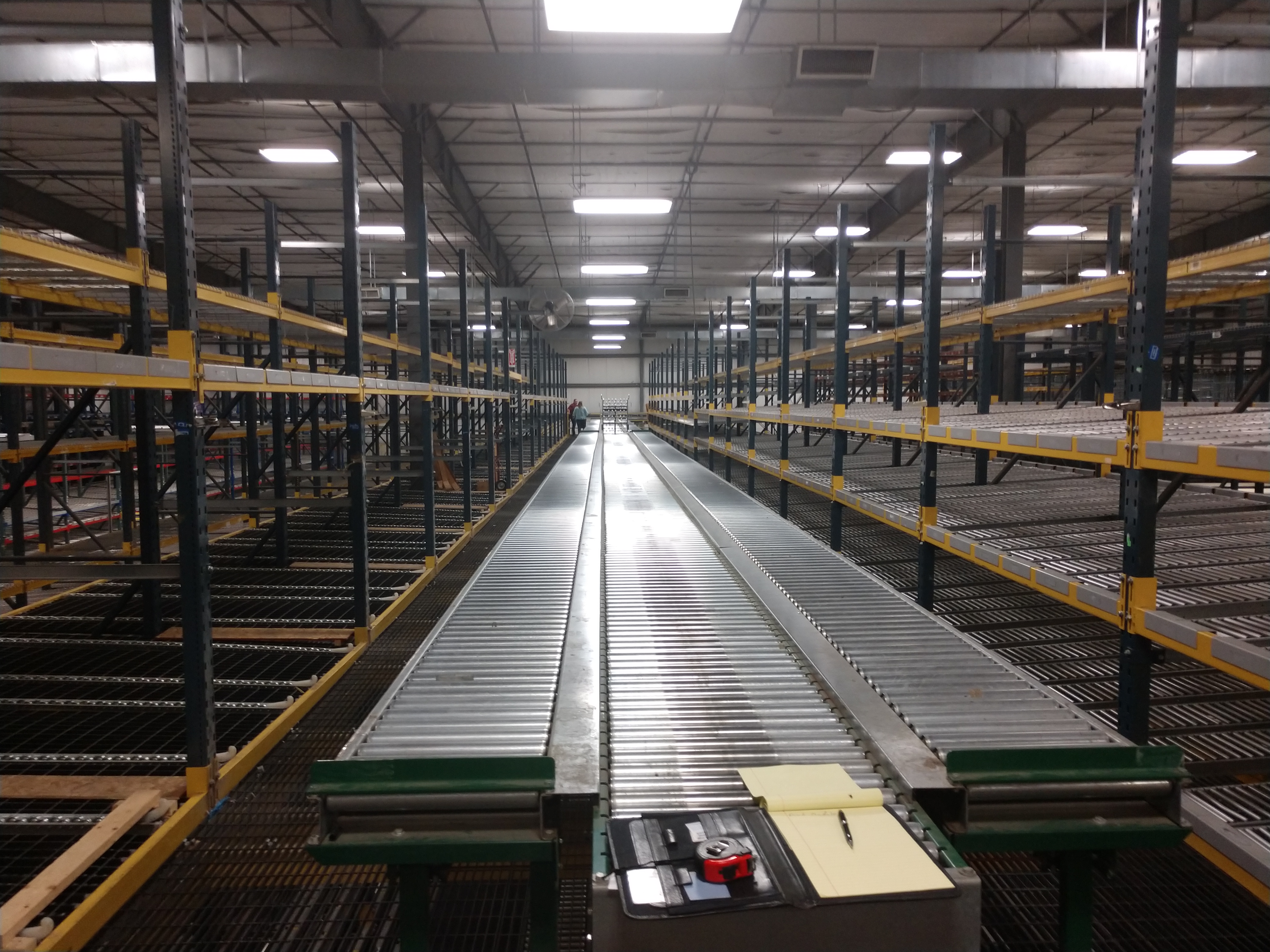 conveyor and storage shelves